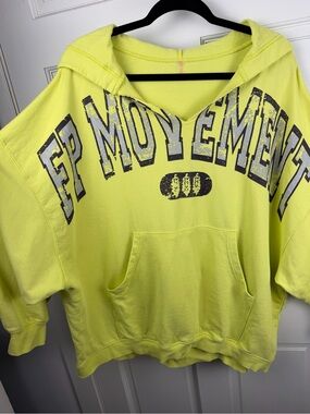 Signature FP Movement graphic print on the front.